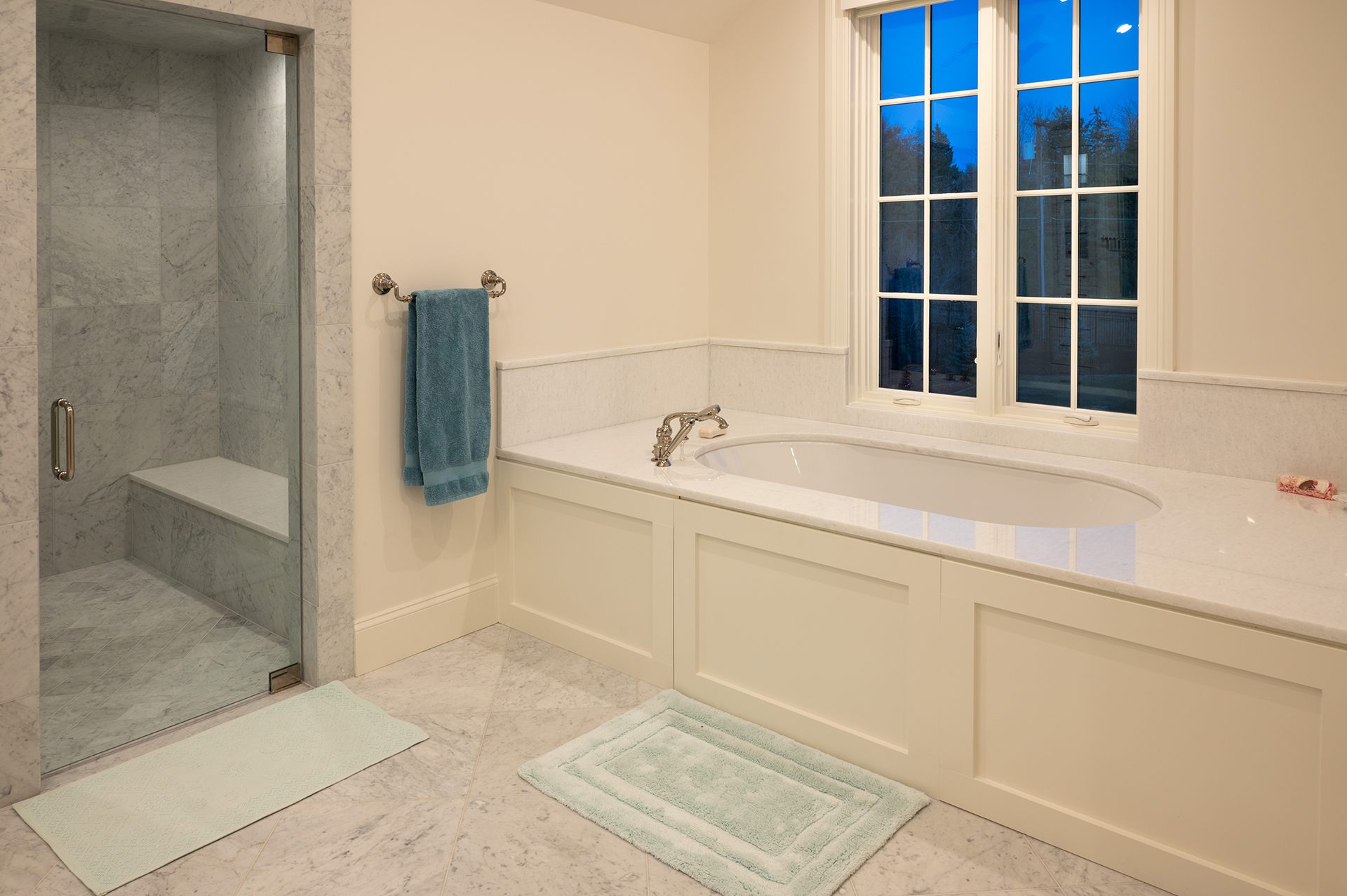 White bathroom with undermount tub