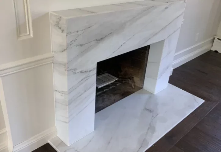 Olympian white marble fireplace
